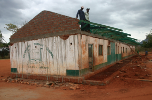 After a windy storm left Muzanwenyi Primary School without a roof, Wildlife Works sent a construction team to repair the school.