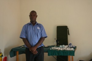 One of the Marie Stopes outreach doctors standing next to the makeshift family planning clinic at Wildlife Works