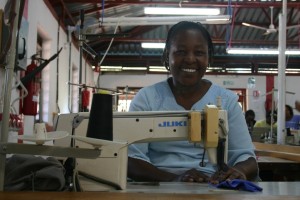 In her free time at the factory, Margaret learns how to use the company's electronic sewing machines